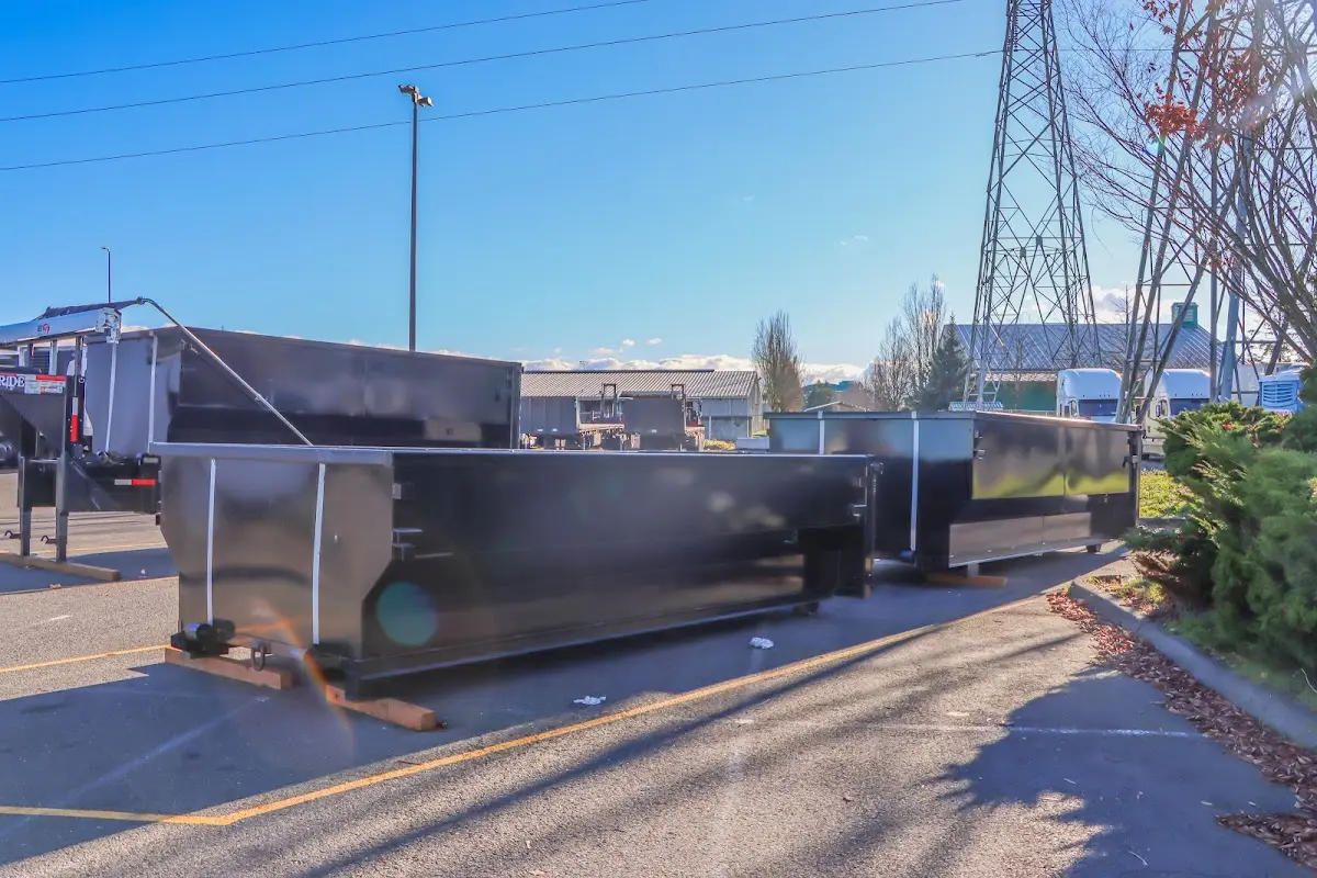 Roll-off dumpster ready for waste disposal at job site for 3 Yard Dumpster Rental in Holly Ridge